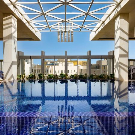 Millennium Place Doha Exterior photo The rooftop pool at the Four Seasons Hotel, Cairo